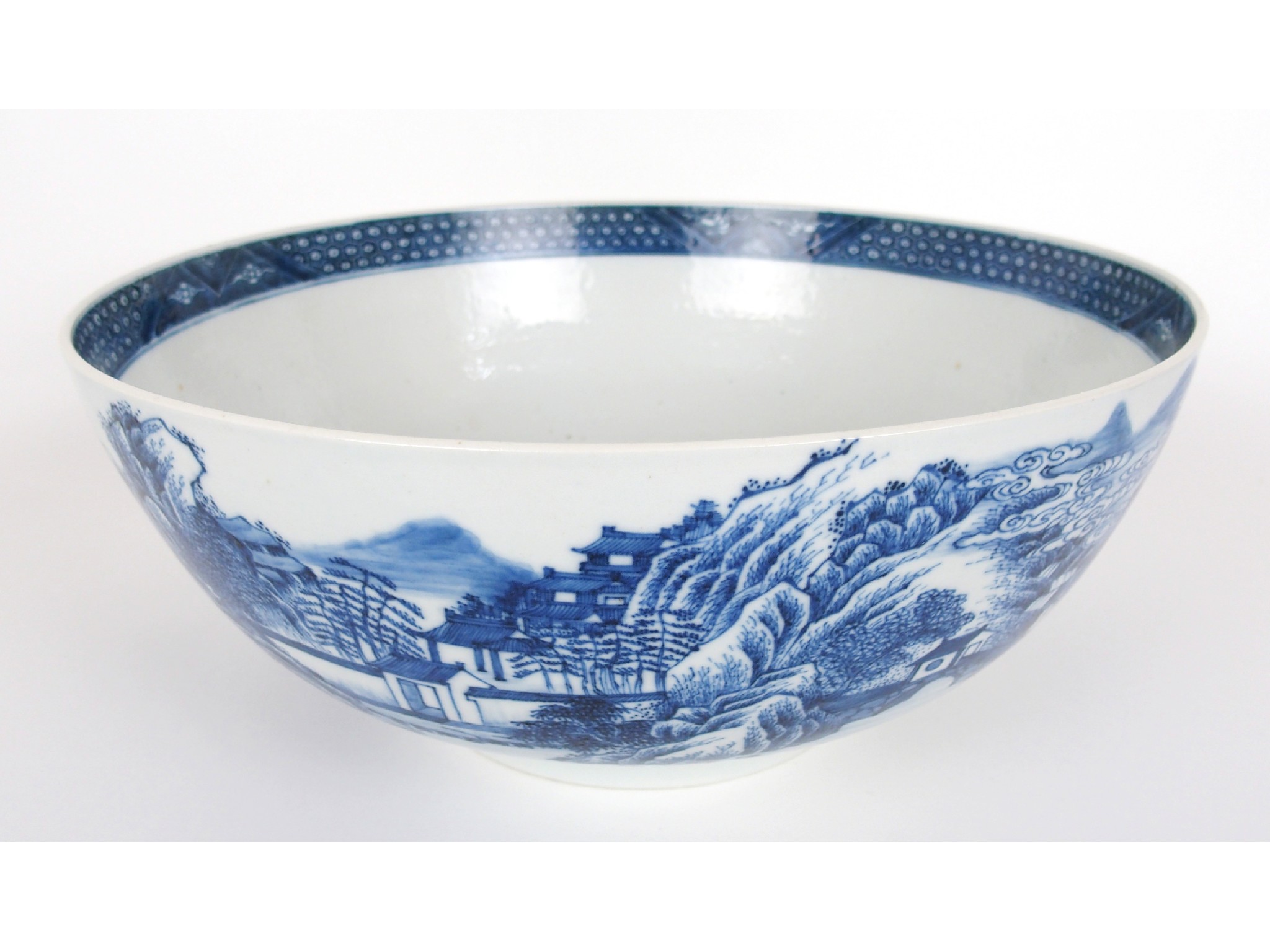 Appraisal: A Chinese export blue and white punch bowlpainted with river