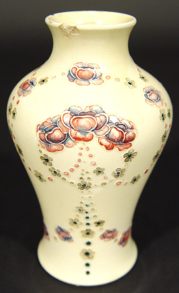 Appraisal: Miniature Moorcroft vase hand painted and tubelined with flowers onto