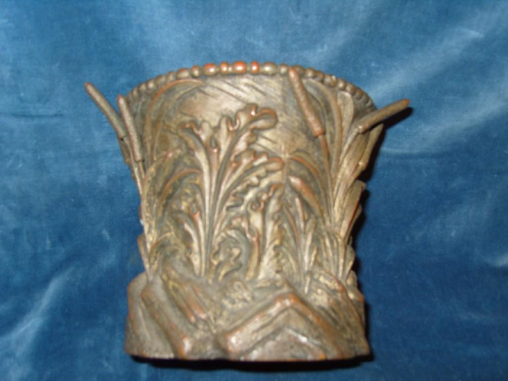 Appraisal: A th century cast metal cache-pot with bulrush and leaf