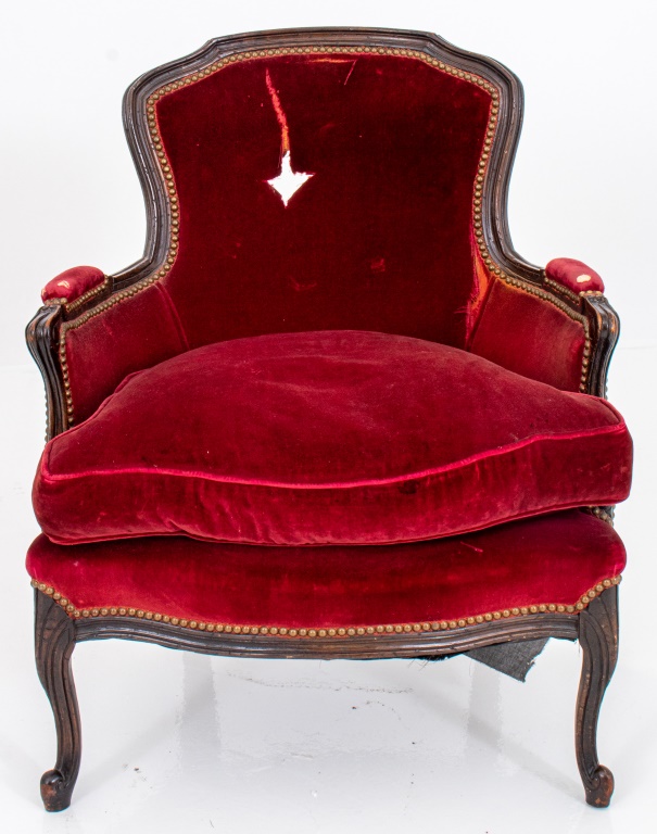 Appraisal: LOUIS XV STYLE UPHOLSTERED BERGERE CHAIR Louis XV style bergere