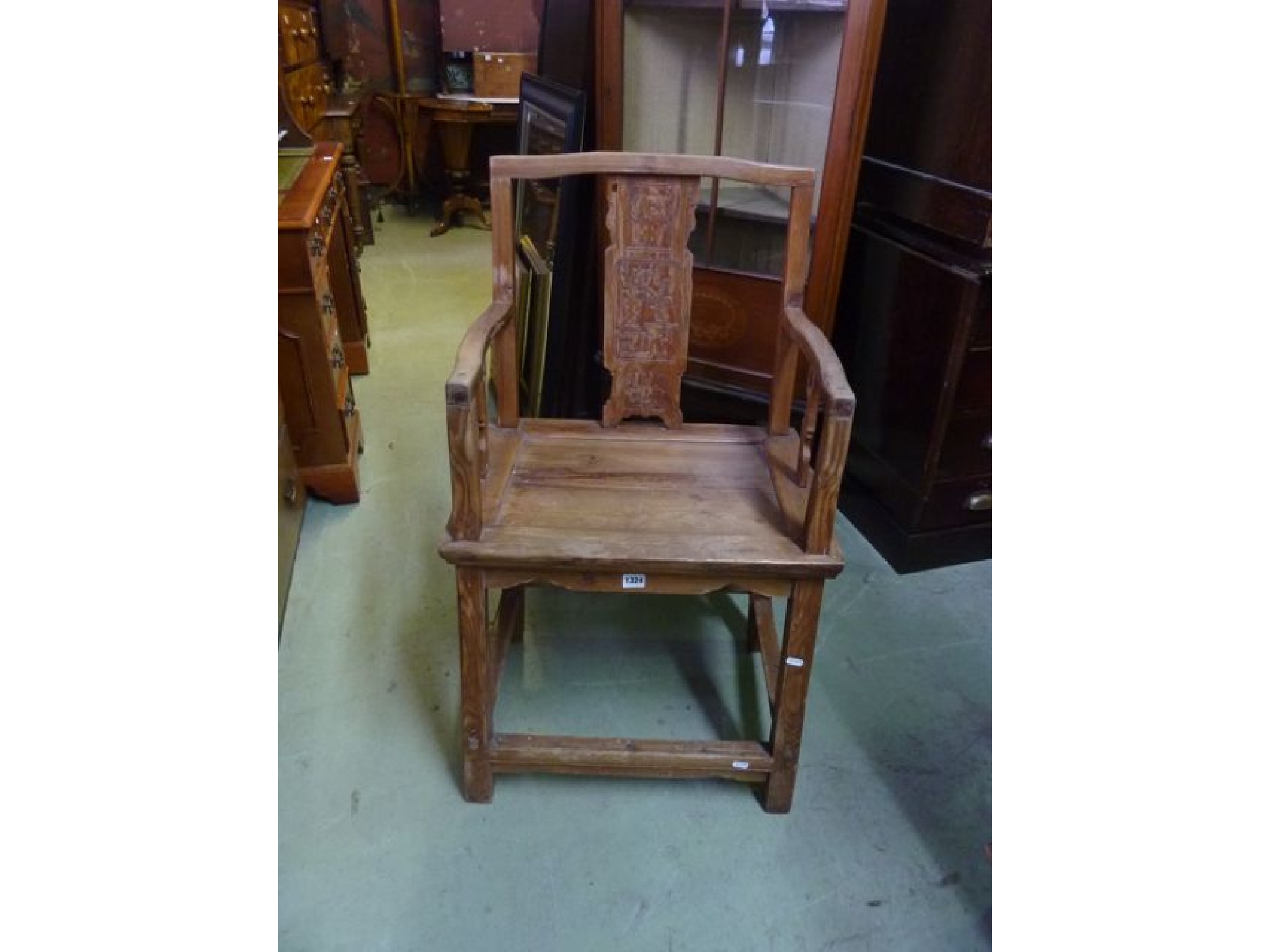 Appraisal: A vintage Chinese elbow chair with stripped pine frame the