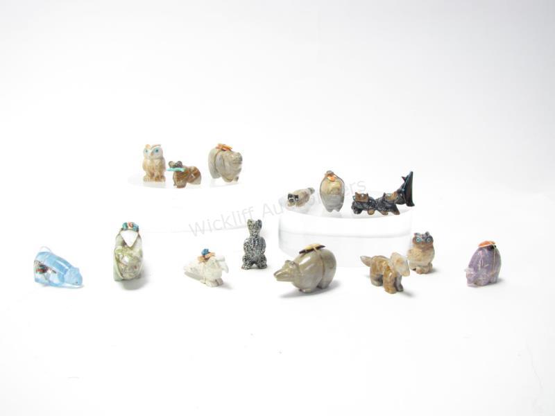 Appraisal: A group of Zuni carved stone fetishes all animals raccoon