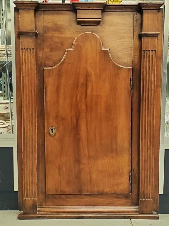 Appraisal: American Chippendale cherry Cupboard circa with shaped door and fulted