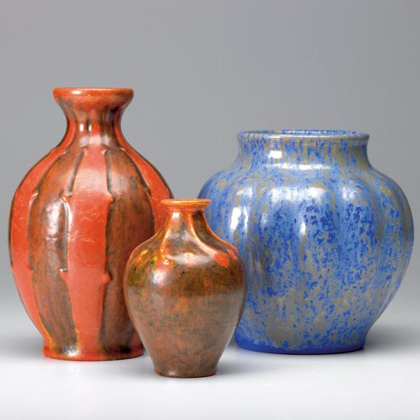 Appraisal: PILKINGTON ROYAL LANCASTRIAN Three vases in mottled yellow-orange or blue