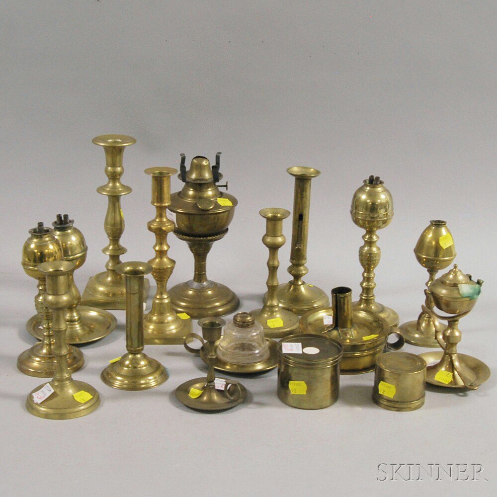 Appraisal: Seventeen Assorted Brass Candlesticks and Fluid-burning Lamps including a chamberstick