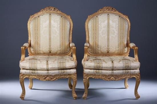 Appraisal: PAIR FRENCH ROCOCO STYLE GILTWOOD FAUTEUILS Late th Century Elaborately