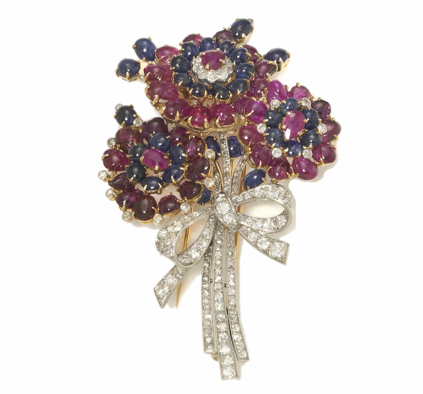 Appraisal: A ruby sapphire and diamond bouquet brooch French featuring carved