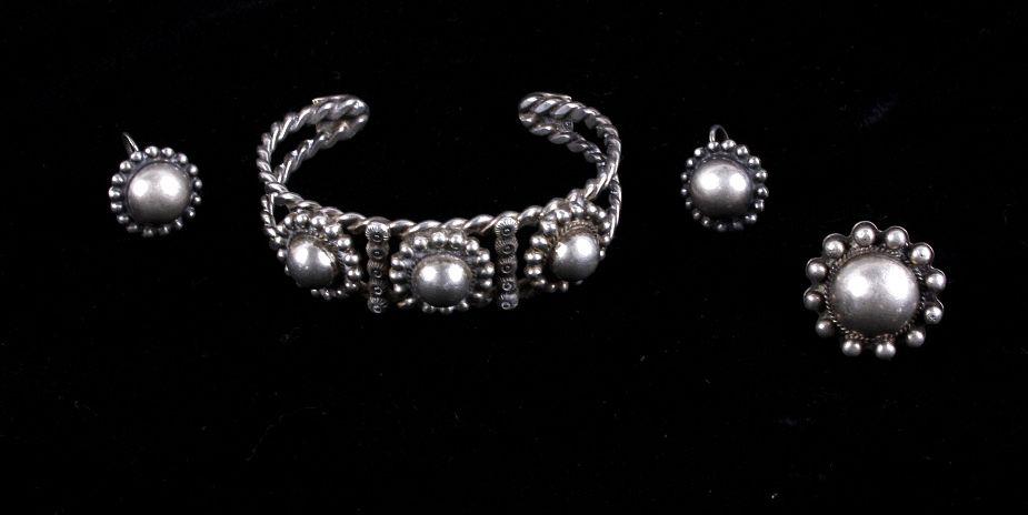 Appraisal: Navajo Sterling Silver Bracelet Ring Earrings This lot features a