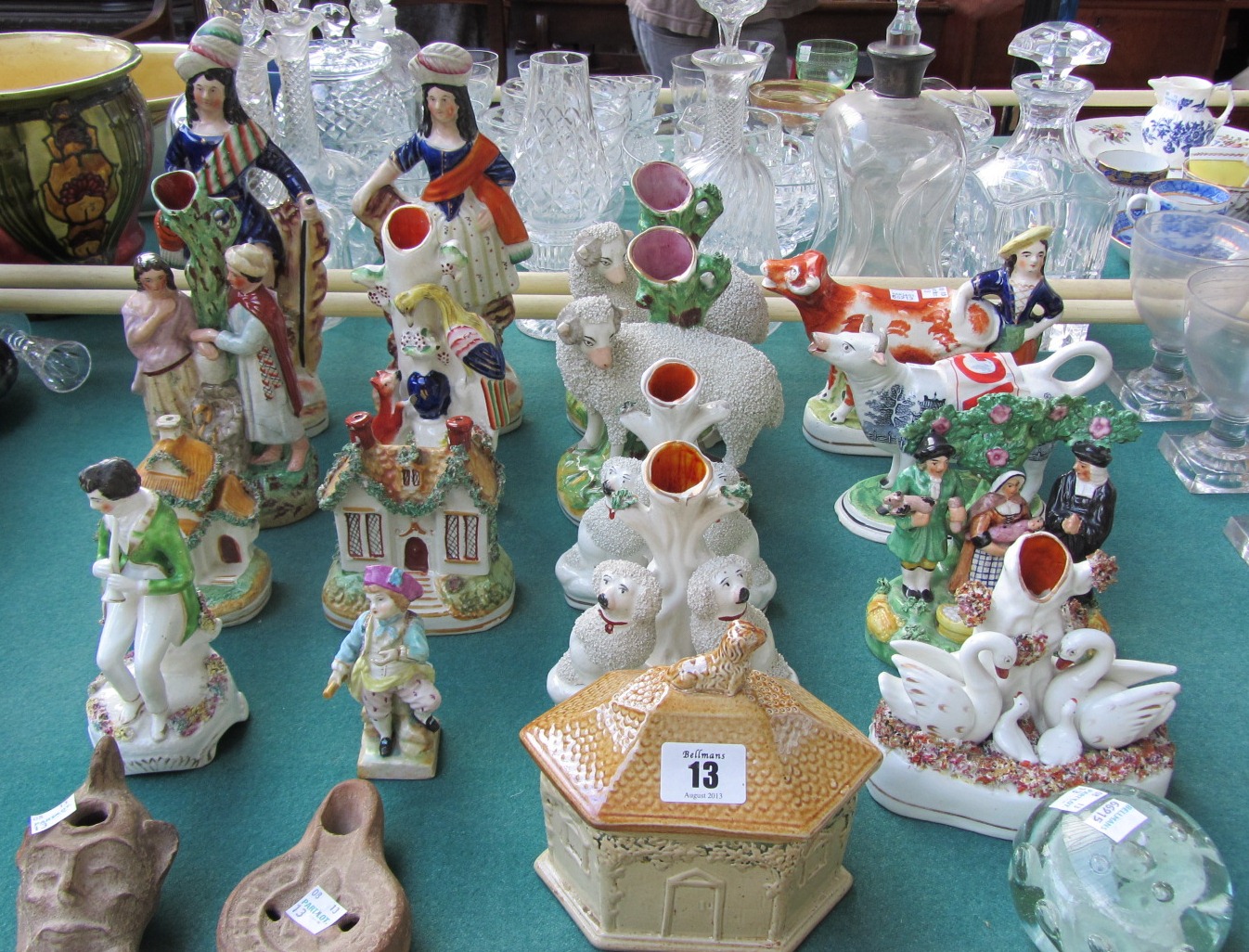 Appraisal: A quantity of Staffordshire pottery figures including a pair of