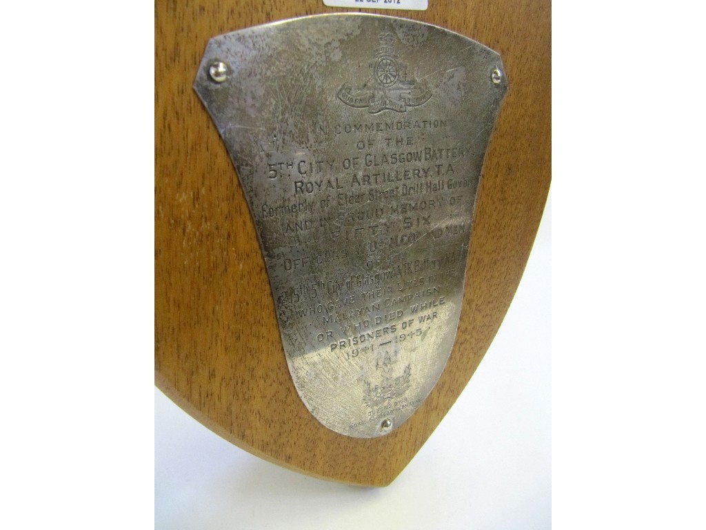 Appraisal: A white metal plate on oak shield plaque engraved in