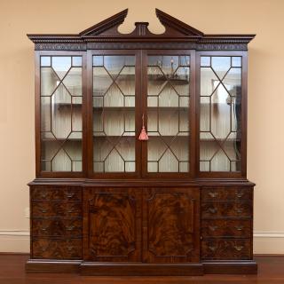 Appraisal: Chippendale mahogany breakfront bookcase Chippendale mahogany breakfront bookcase th c