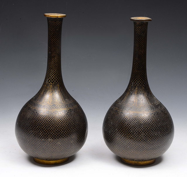 Appraisal: A PAIR OF SOUTH EAST ASIAN CLOISONN ENAMEL BOTTLE VASES