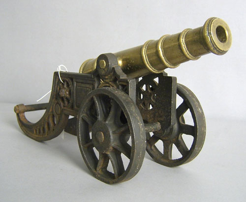 Appraisal: English brass signal cannon with iron base l