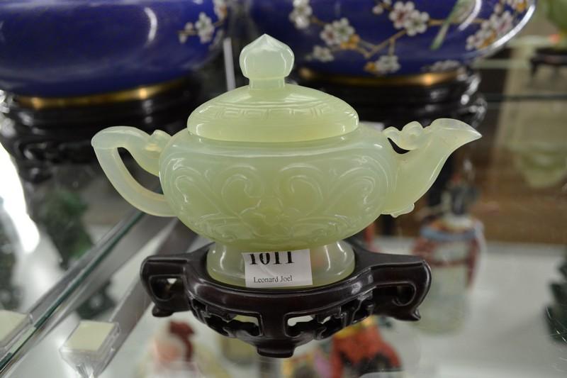 Appraisal: SMALL JADE TEAPOT ON WOODEN STAND