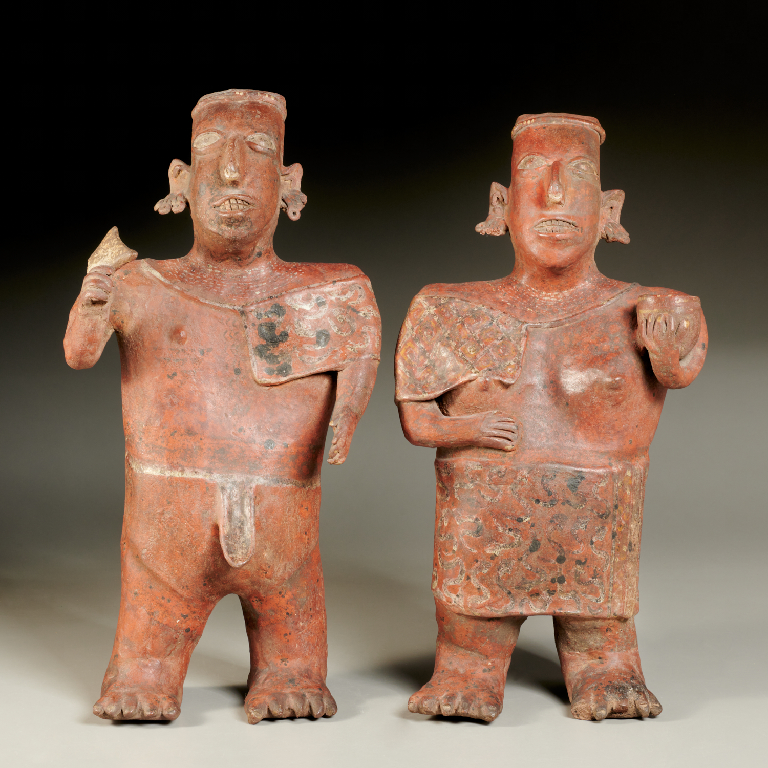 Appraisal: PAIR NAYARIT POTTERY FIGURES EX-PARKE-BERNET Pre-Columbian Mexico pair redware standing