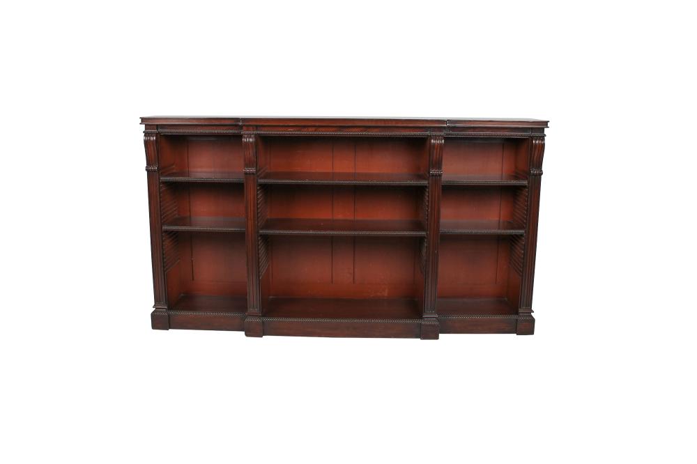 Appraisal: REGENCY STYLE MAHOGANY BREAKFRONT BOOKSHELFwith adjustable shelves Condition with loss