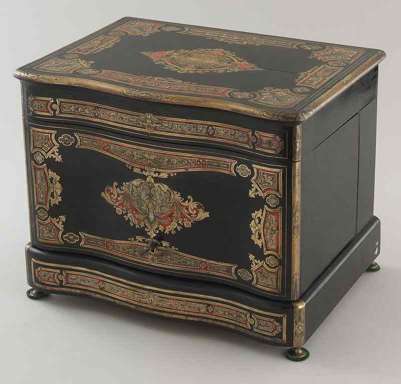 Appraisal: Napoleon III ebonized and inlaid cave a liqueur the top