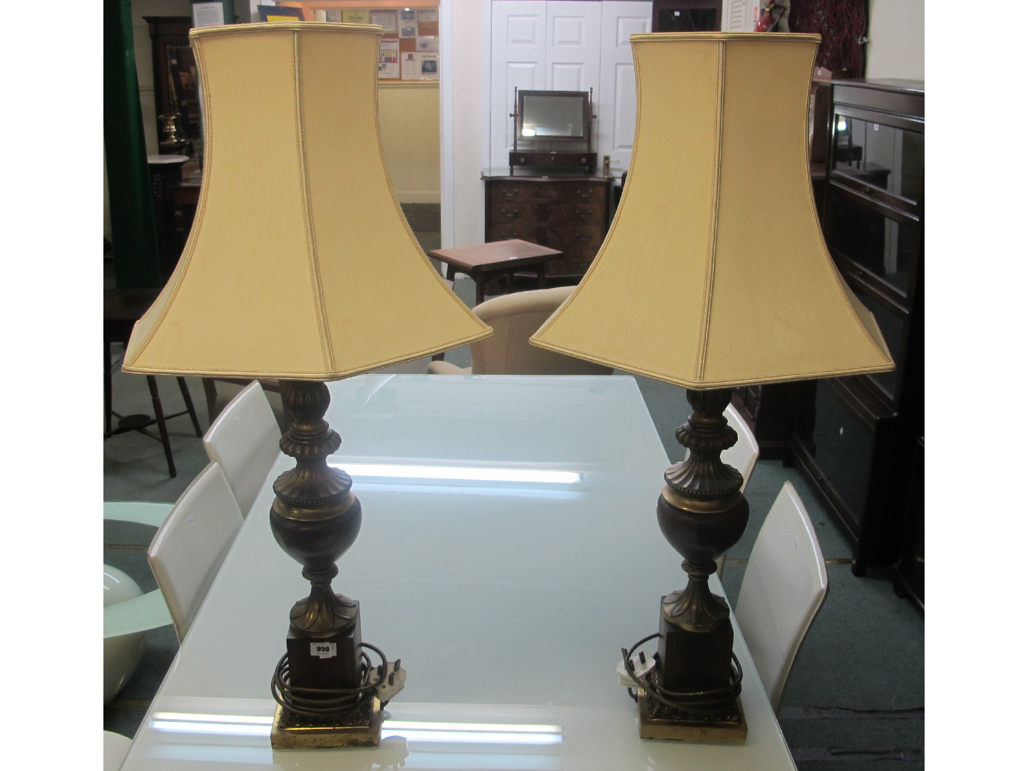 Appraisal: Two wood and brass table lamps