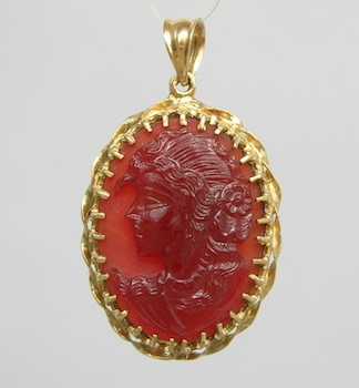 Appraisal: A Carved Carnelian Cameo in Gold Frame k yellow gold