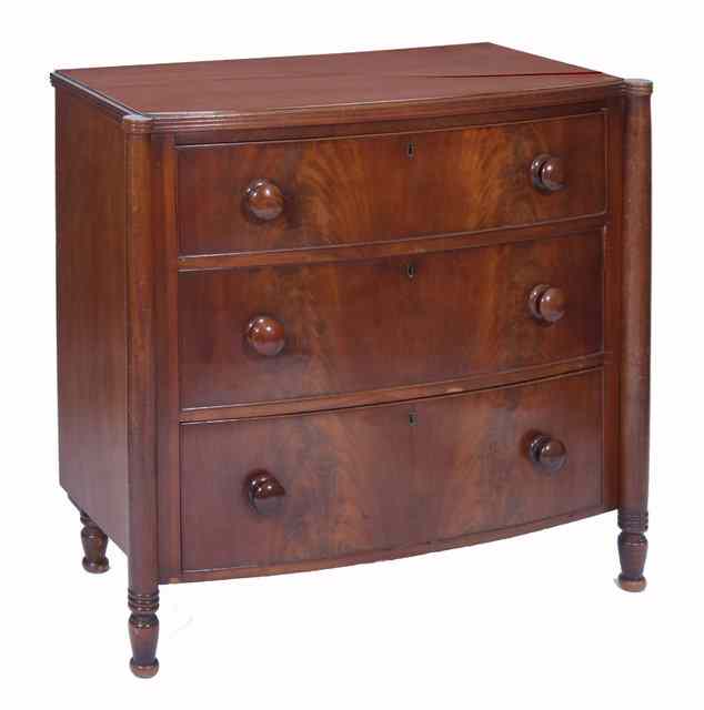 Appraisal: A VICTORIAN MAHOGANY BOW FRONTED CHEST of three long drawers