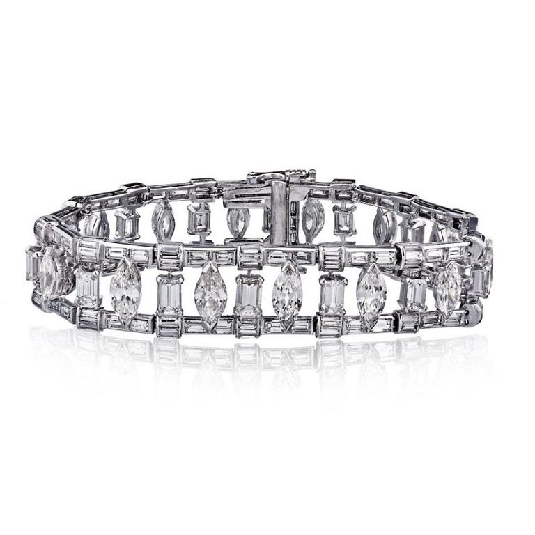 Appraisal: PLATINUM OPENWORK BAGUETTE EMERALD CUT AND MARQUI Of architectural design