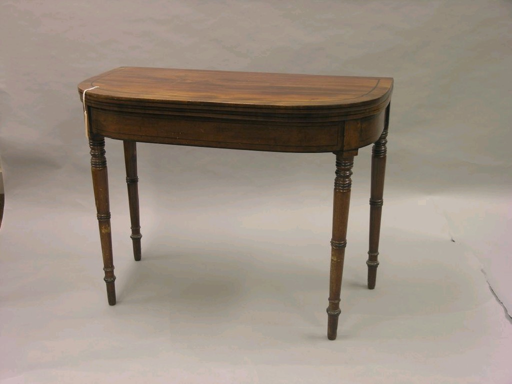 Appraisal: An early th century mahogany card table D-shape top enclosing