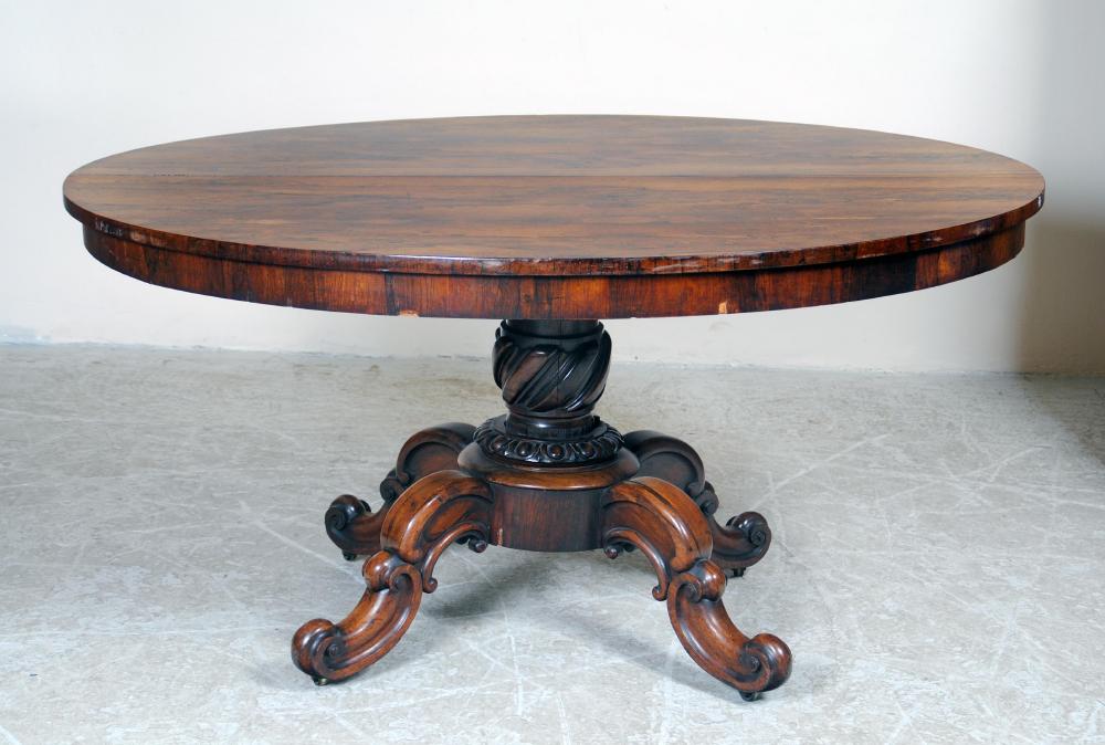 Appraisal: A VICTORIAN ROSEWOOD LOO TABLE the moulded edged top on