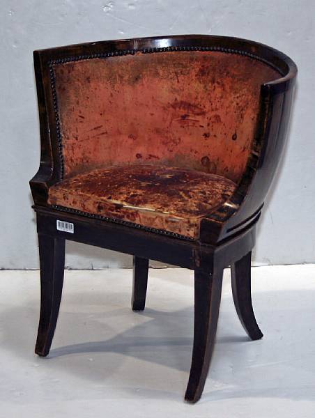 Appraisal: A German Neoclassical leather upholstered walnut armchair first quarter th