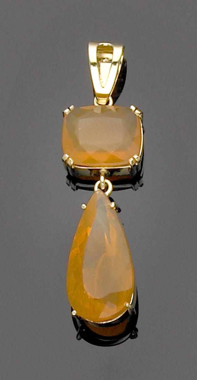 Appraisal: Fire Opal Pendant Mounted with two tangerine orange Brazilian fire