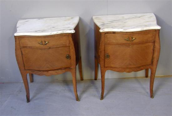 Appraisal: Pair of th century kingwood marble topped serpentine bedside cabinets