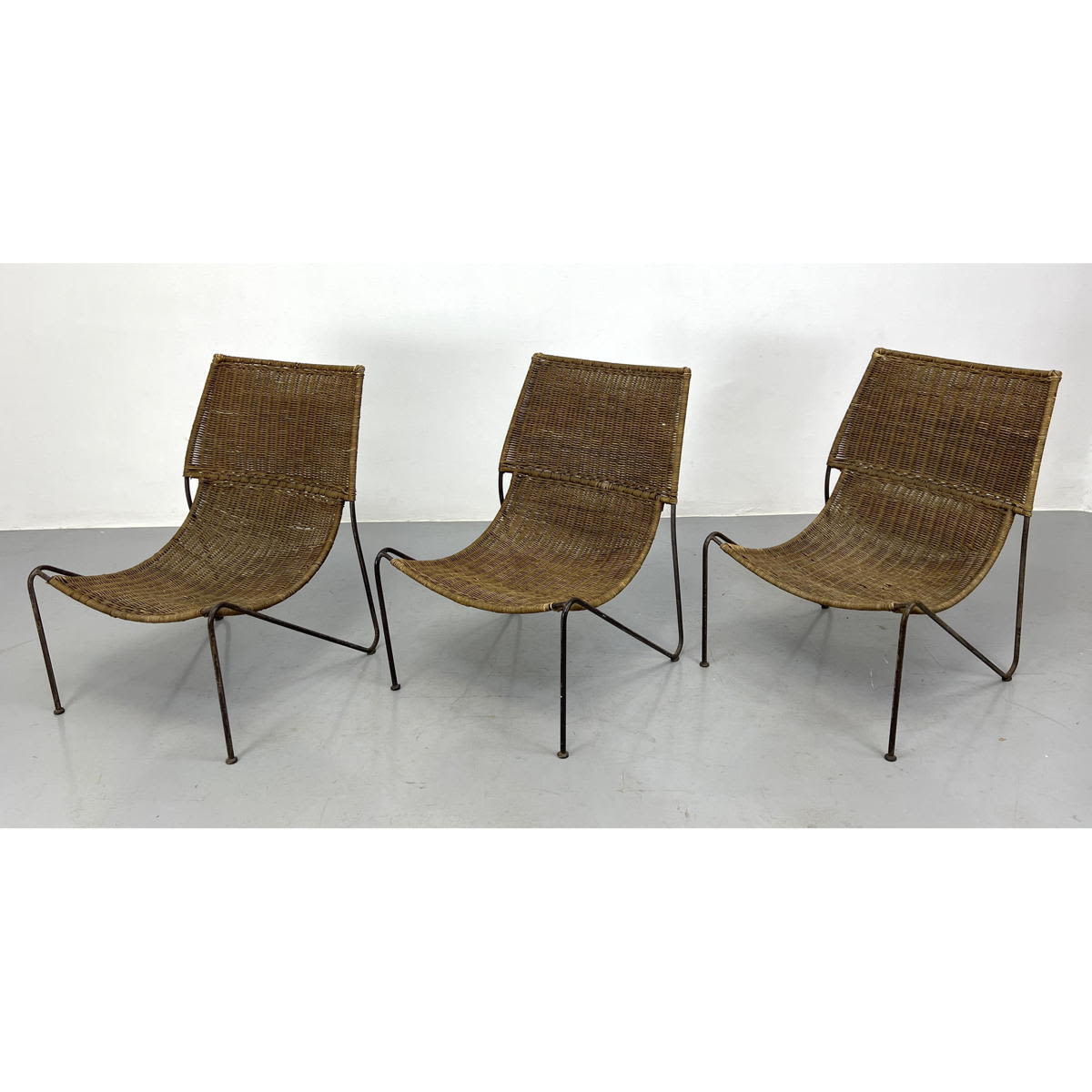 Appraisal: Set Woven Rattan and Metal Sling Lounge Chair Dimensions H