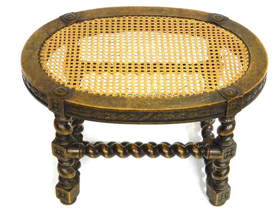 Appraisal: Jacobean style stool oval carved top with mullion decoration spiral