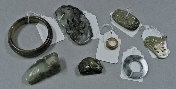 Appraisal: Seven hardstone ornaments Including one bracelet one ring one mottled