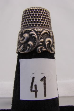 Appraisal: Sterling thimble with wide decorative band