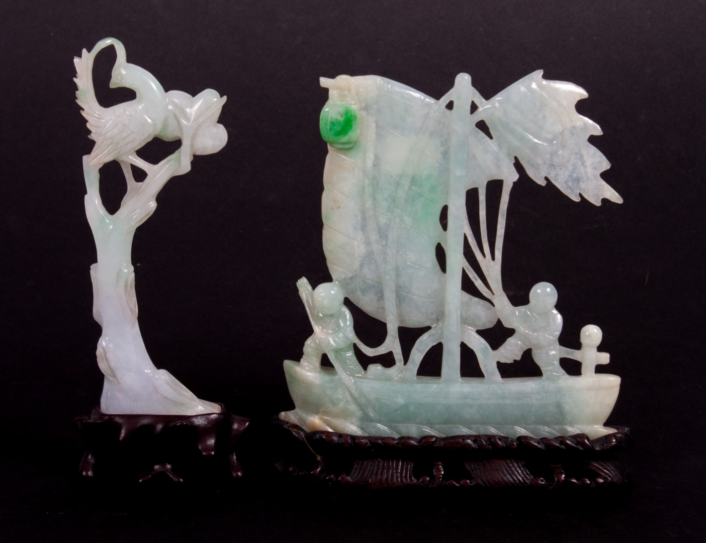 Appraisal: Two Chinese carved jade figural groups groups include two men