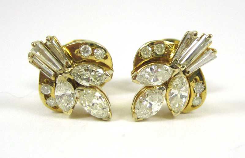 Appraisal: PAIR OF DIAMOND AND FOURTEEN KARAT GOLD EARRINGS each set