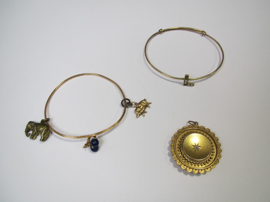 Appraisal: Lot comprising two Edwardian ct gold bangles and a Victorian