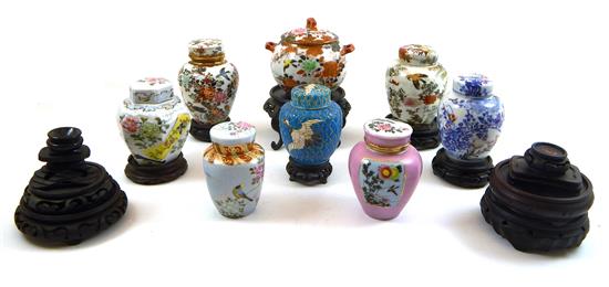 Appraisal: ASIAN assortment of small covered jars and lacquered stands twenty-two