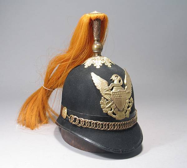 Appraisal: A U S Model cavalry helmet The blue cloth-covered helmet