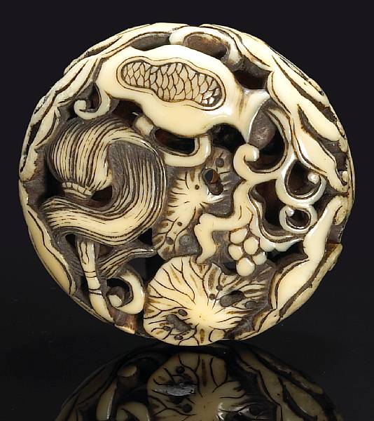 Appraisal: A walrus ivory ryusa netsuke th Century Carved in cloud