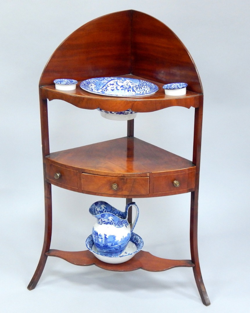 Appraisal: A George III mahogany corner washstand cm x cm x