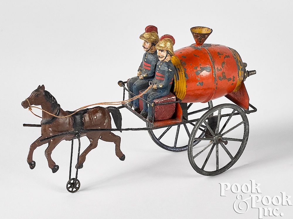 Appraisal: French painted tin horse drawn fire water wagon French painted