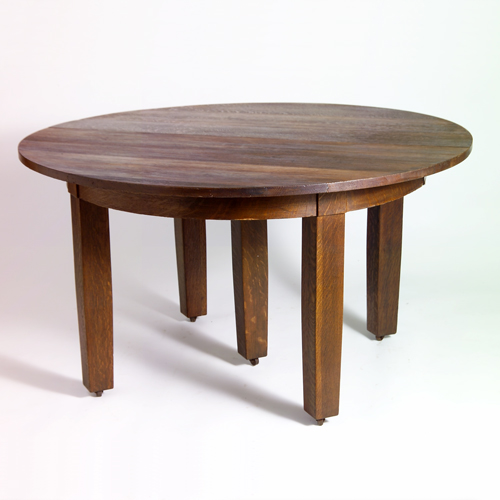 Appraisal: Arts Crafts five-legged dining table with circular top and two