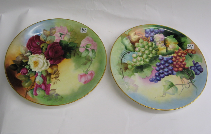 Appraisal: PAIR FRENCH LIMOGES PORCELAIN CHARGERS hand painted D One with