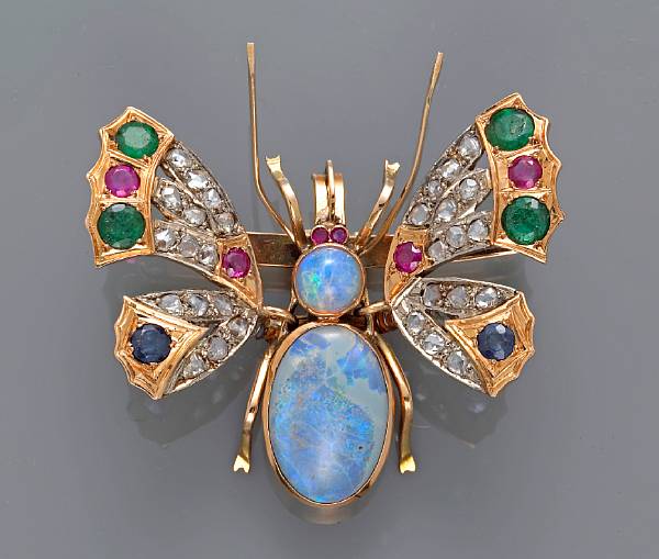 Appraisal: An opal gem-set and diamond en tremblant butterfly brooch mounted