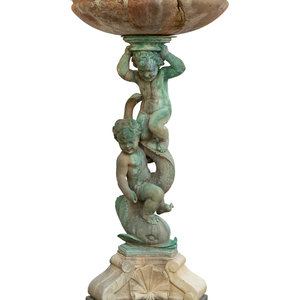 Appraisal: A Cast Bronze and Stone Fountain TH CENTURY having putti