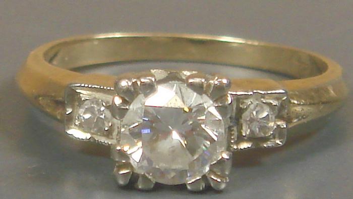 Appraisal: K YG diamond ring pt center stone flanked by two