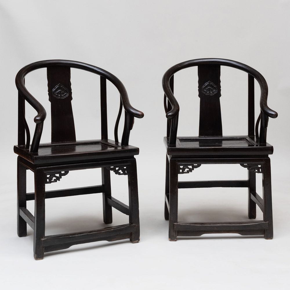 Appraisal: Pair of Chinese Ebonized Horseshoe Back Armchairs x x in