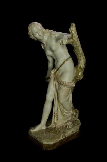 Appraisal: A Royal Worcester figure The Bather Surprised a scantily draped