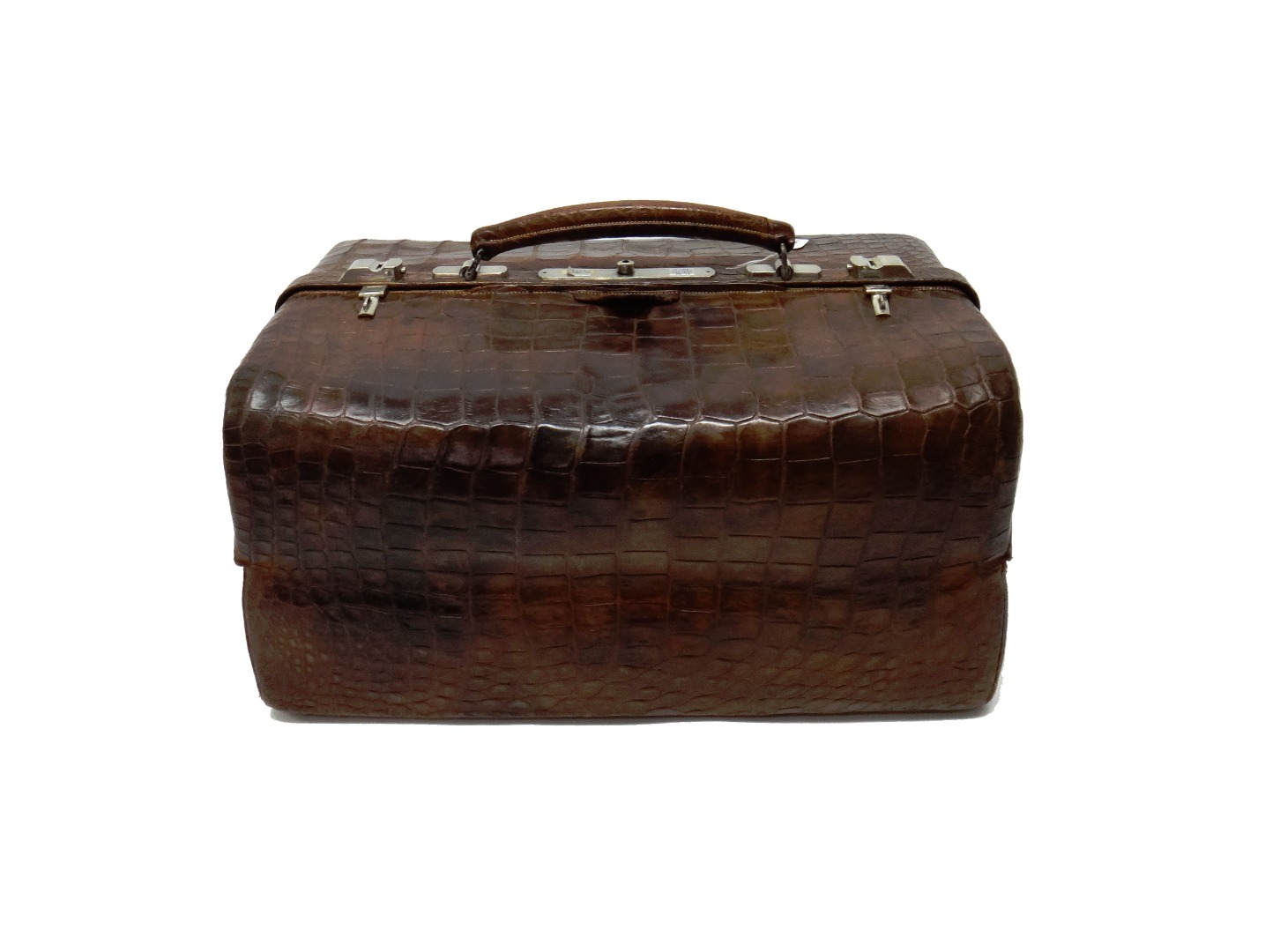 Appraisal: An Edwardian gentleman's crocodile travelling fitted toilet case of Gladstone